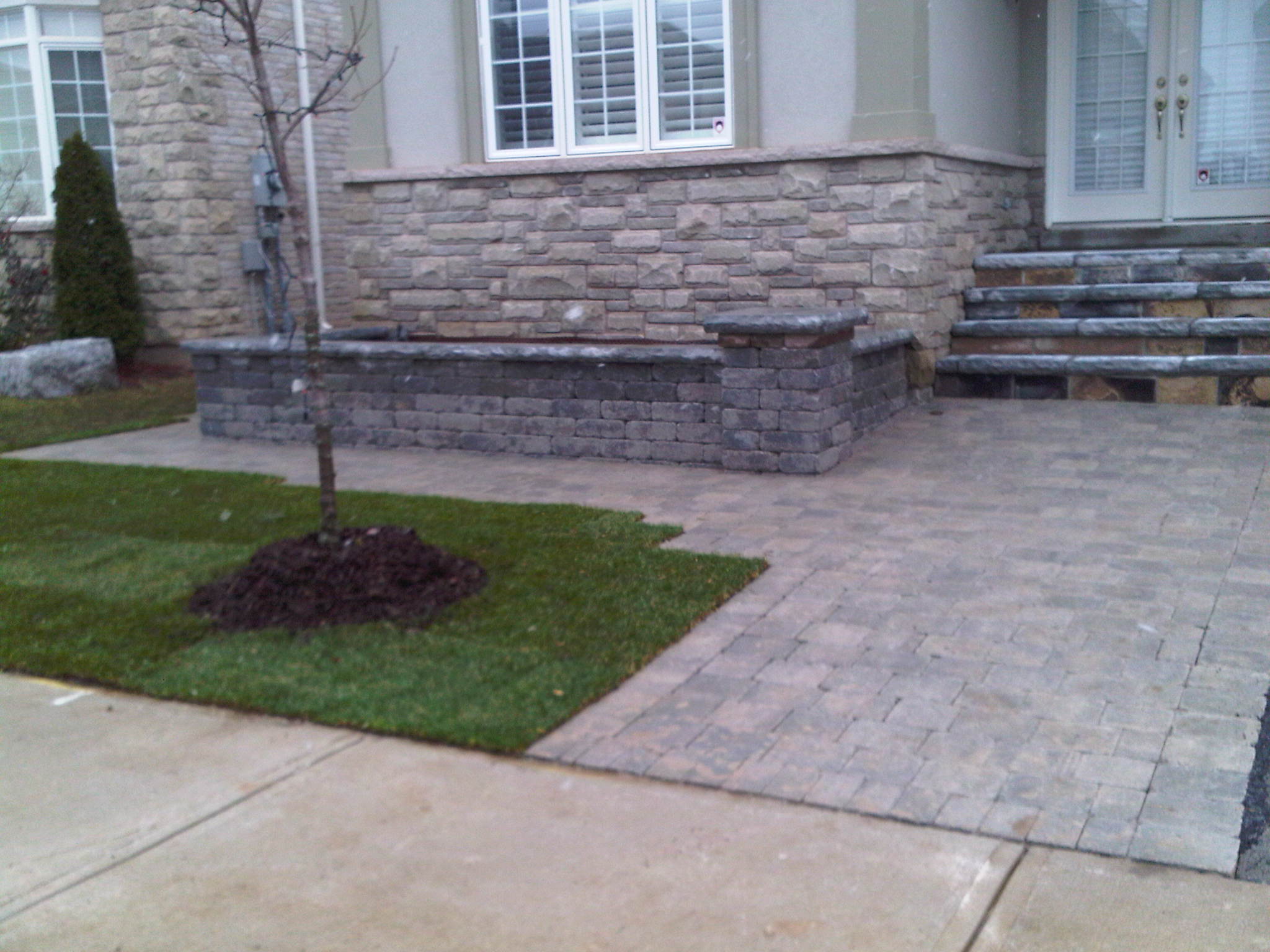 Front entrance stone work by Total Landscaping Services