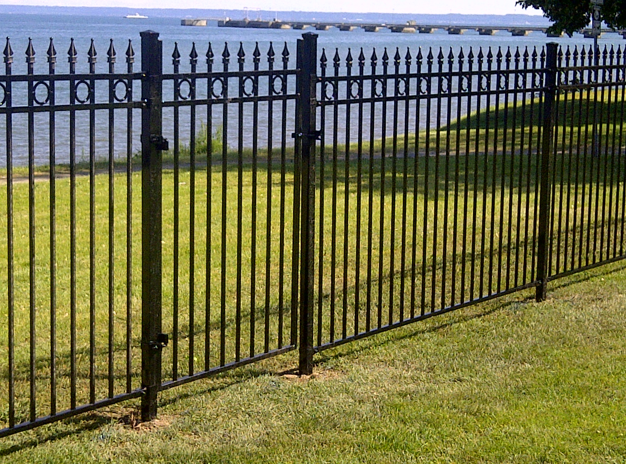 Wrought iron fence by Total Landscaping Services