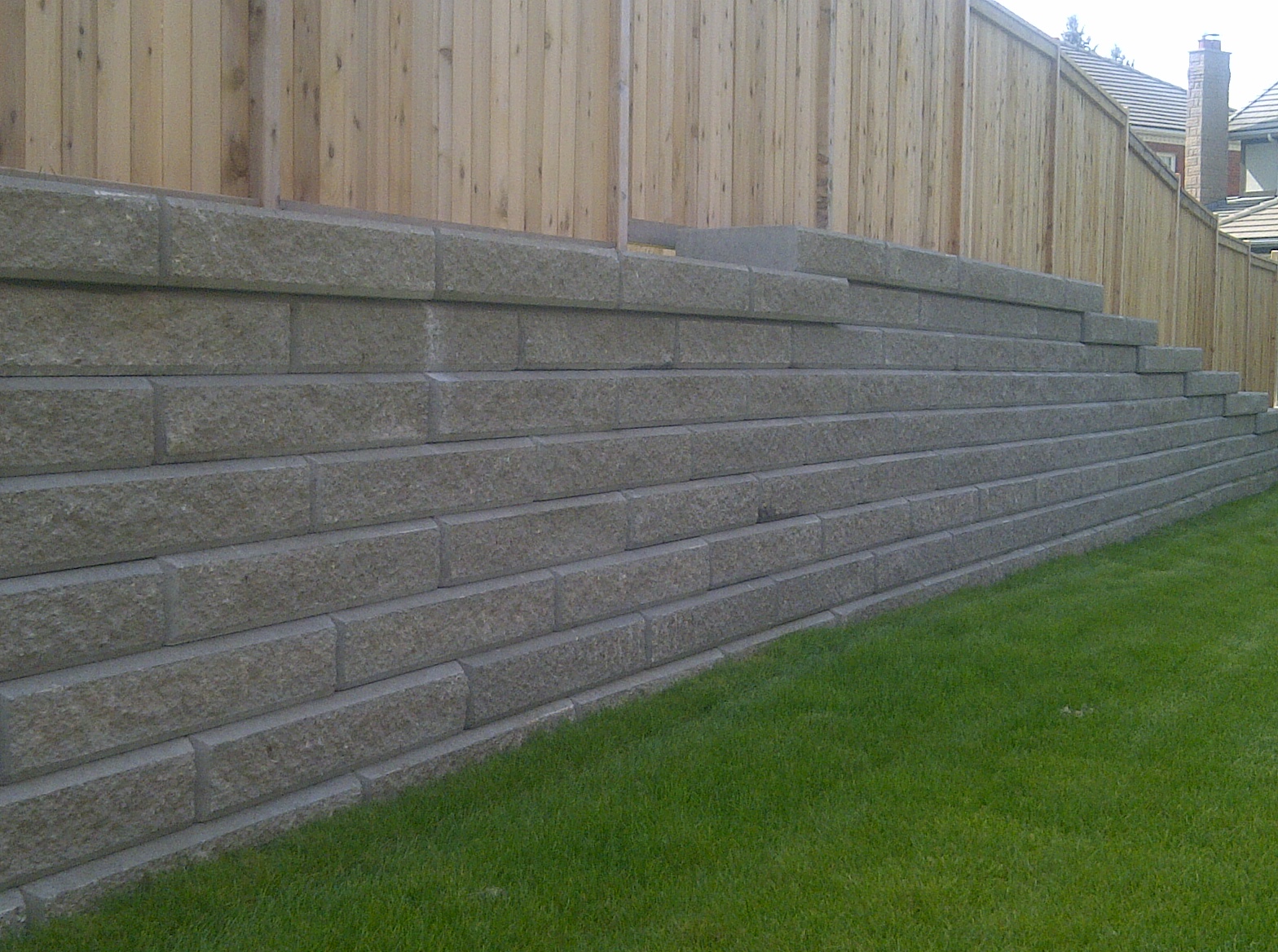 Retaining wall by Total Landscaping Services